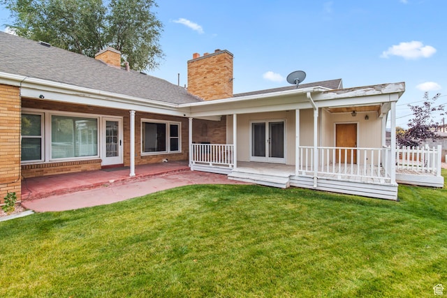 455 N 500 W, Richfield, UT 84701 - rear view of house featuring a chimney, a yard, and a shingled roof