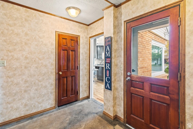 455 N 500 W, Richfield, UT 84701 - foyer entrance with crown molding, a textured ceiling, baseboards, and concrete flooring