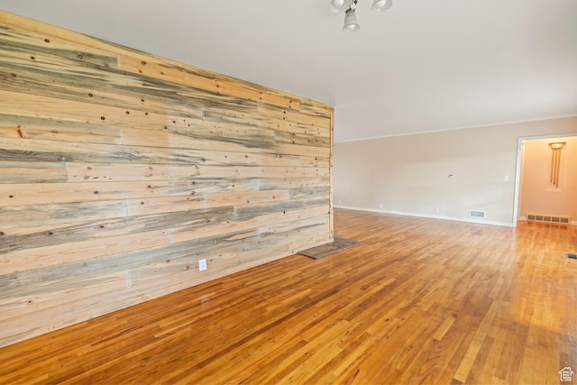 455 N 500 W, Richfield, UT 84701 - unfurnished room with light wood-type flooring, wooden walls, and baseboards