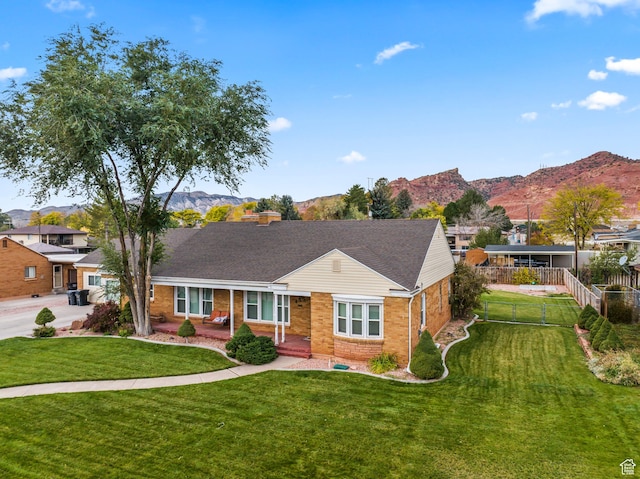 455 N 500 W, Richfield, UT 84701 - ranch-style home featuring brick siding, a mountain view, and a shingled roof