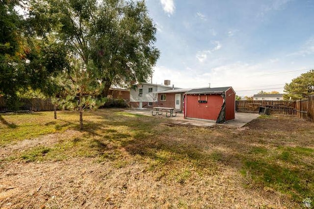 4143 S 2200th St W, Taylorsville, UT 84129 - view of yard with a patio area, an outdoor structure, and a storage shed