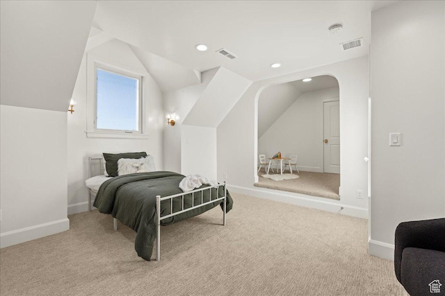 bedroom with vaulted ceiling, recessed lighting, carpet flooring, and baseboards