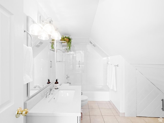 bathroom featuring tile patterned flooring, toilet, and vanity