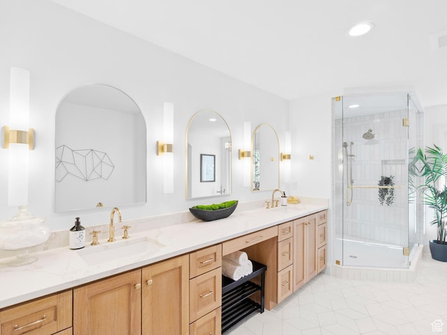 full bathroom featuring double vanity, a shower stall, tile patterned floors, and recessed lighting