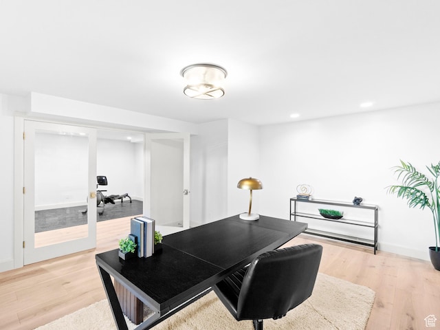 office with light wood-type flooring, recessed lighting, and baseboards