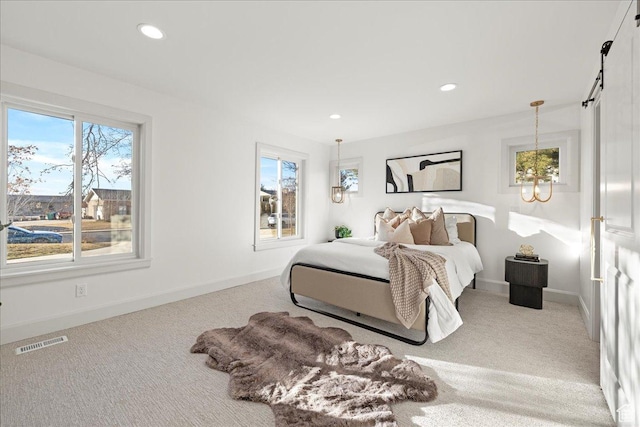 bedroom featuring multiple windows, carpet floors, recessed lighting, and baseboards