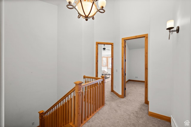 3025 Lower Saddleback Rd Unit 13, Park City, UT 84098 - hall featuring light colored carpet and a chandelier