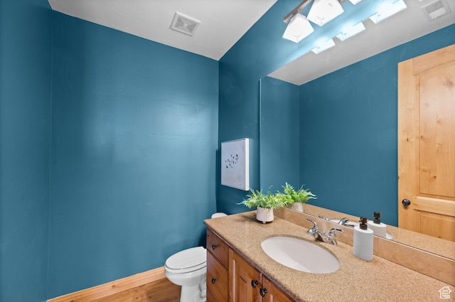 3025 Lower Saddleback Rd Unit 13, Park City, UT 84098 - bathroom with vanity, hardwood / wood-style floors, and toilet