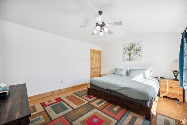 6042 N Fox Pointe Cir, Park City, UT 84098 - bedroom with vaulted ceiling, ceiling fan, and baseboards
