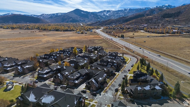 6042 N Fox Pointe Cir, Park City, UT 84098 - aerial view of property's location with a mountain backdrop and nearby suburban area