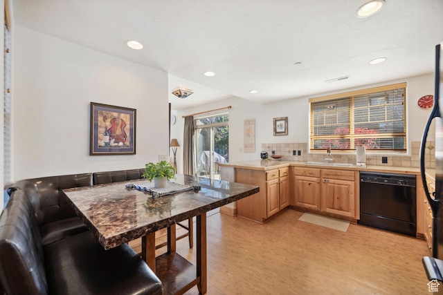 6042 N Fox Pointe Cir, Park City, UT 84098 - kitchen with dishwasher, light brown cabinets, light wood-type flooring, tasteful backsplash, and a sink