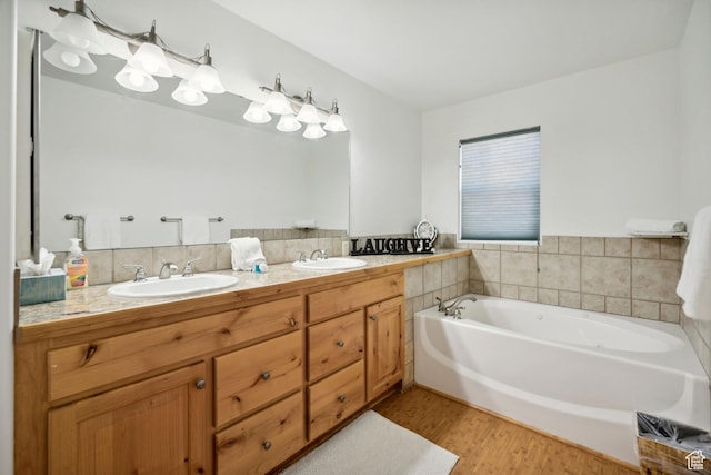6042 N Fox Pointe Cir, Park City, UT 84098 - full bath featuring wood finished floors, double vanity, and a garden tub
