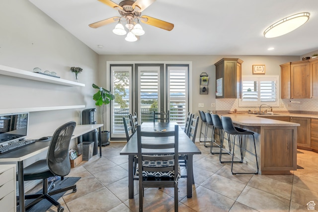 1122 Ironwood Rd, Erda, UT 84074 - tiled dining area featuring sink and ceiling fan