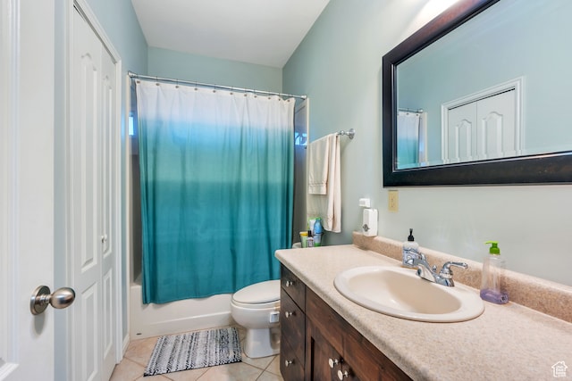 1122 Ironwood Rd, Erda, UT 84074 - full bathroom featuring shower / bath combo with shower curtain, tile patterned floors, vanity, and toilet