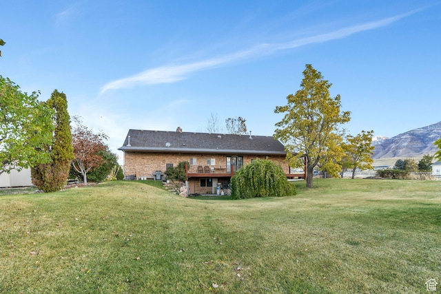 1122 Ironwood Rd, Erda, UT 84074 - view of yard featuring a deck with mountain view
