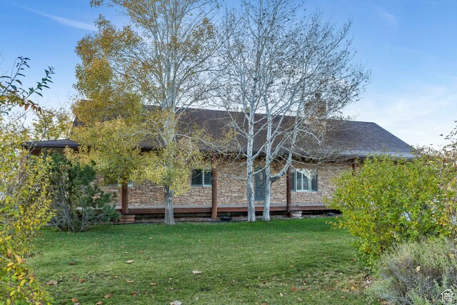 1122 Ironwood Rd, Erda, UT 84074 - back of property featuring a yard