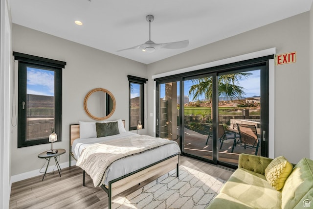 1498 W Torrey Pines Rd, Hurricane, UT 84737 - bedroom featuring access to outside, light wood-style flooring, recessed lighting, baseboards, and a ceiling fan