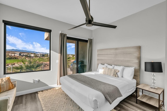1498 W Torrey Pines Rd, Hurricane, UT 84737 - bedroom with access to exterior, wood finished floors, a ceiling fan, baseboards, and a mountain view
