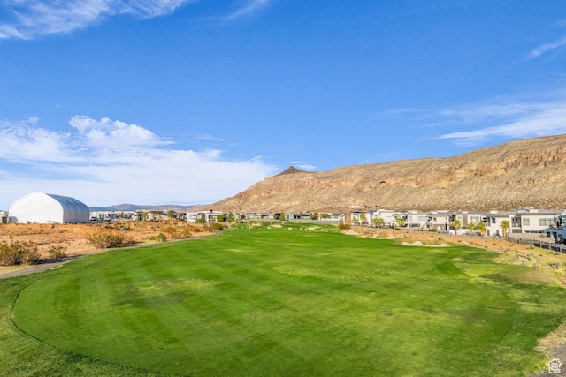 1498 W Torrey Pines Rd, Hurricane, UT 84737 - view of green lawn with a mountain view, golf course view, and a residential view