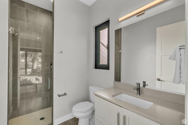 1498 W Torrey Pines Rd, Hurricane, UT 84737 - bathroom featuring a shower stall, vanity, and toilet