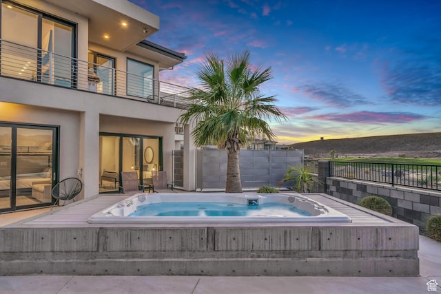 1498 W Torrey Pines Rd, Hurricane, UT 84737 - pool at dusk featuring fence