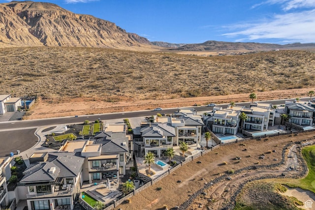 1498 W Torrey Pines Rd, Hurricane, UT 84737 - aerial overview of property's location featuring nearby suburban area and a mountain backdrop