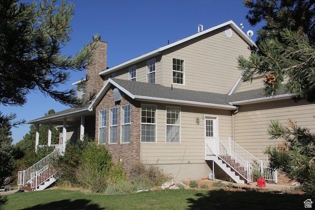 1627 W 950 S, Parowan, UT 84761 - rear view of house with stairs, a chimney, a yard, and stone siding