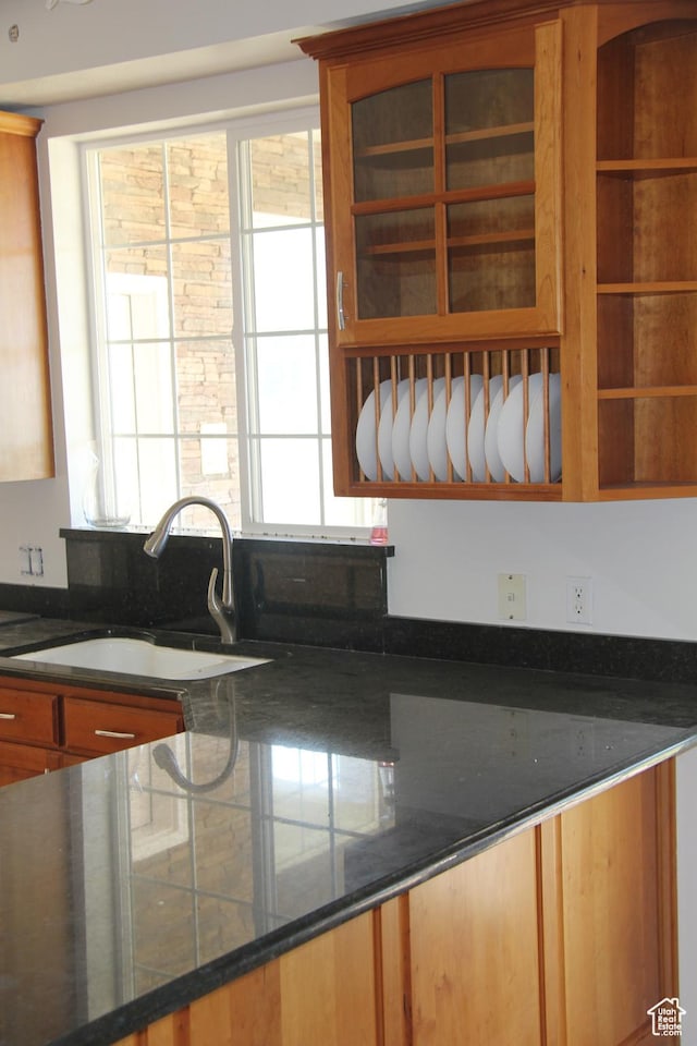 1627 W 950 S, Parowan, UT 84761 - kitchen with a sink, dark countertops, and brown cabinets