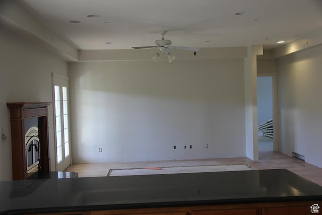 1627 W 950 S, Parowan, UT 84761 - unfurnished living room with ceiling fan and light wood-style floors
