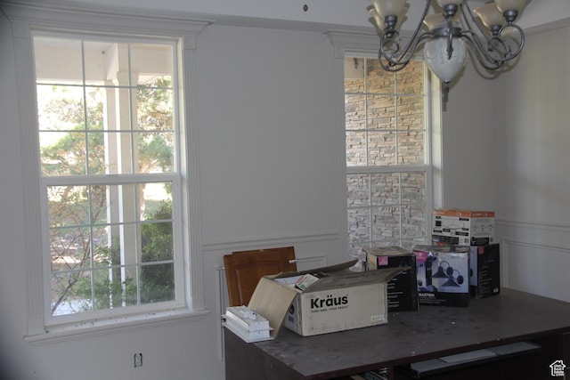 1627 W 950 S, Parowan, UT 84761 - dining area with a chandelier, plenty of natural light, and a decorative wall