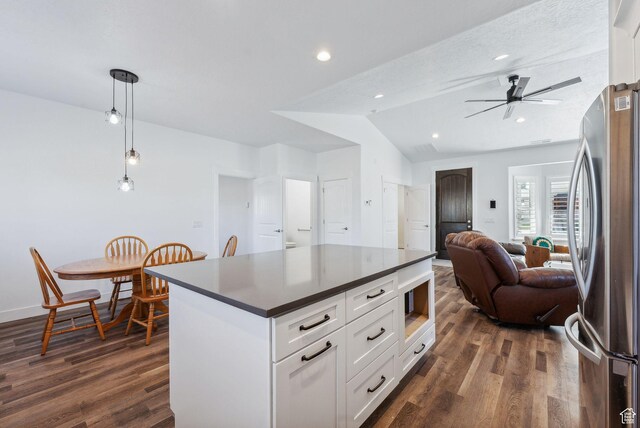 967 W Yamada Ct S, Syracuse, UT 84075 - kitchen featuring freestanding refrigerator, dark countertops, dark wood-type flooring, a ceiling fan, and open floor plan
