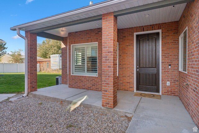 967 W Yamada Ct S, Syracuse, UT 84075 - doorway to property featuring brick siding