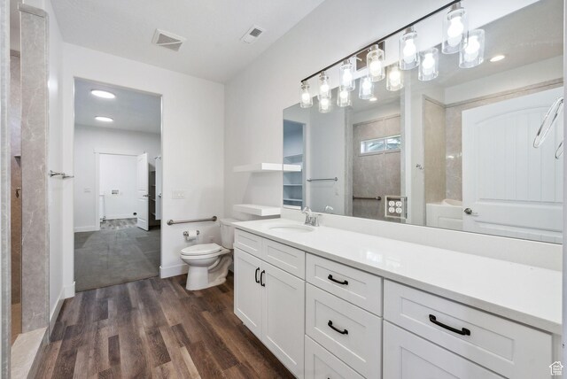 967 W Yamada Ct S, Syracuse, UT 84075 - full bathroom with vanity, wood finished floors, a shower, and recessed lighting