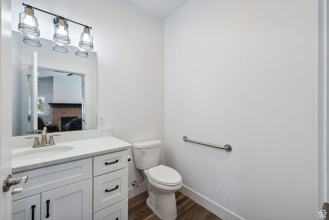 967 W Yamada Ct S, Syracuse, UT 84075 - bathroom featuring vanity, wood finished floors, and ensuite bath