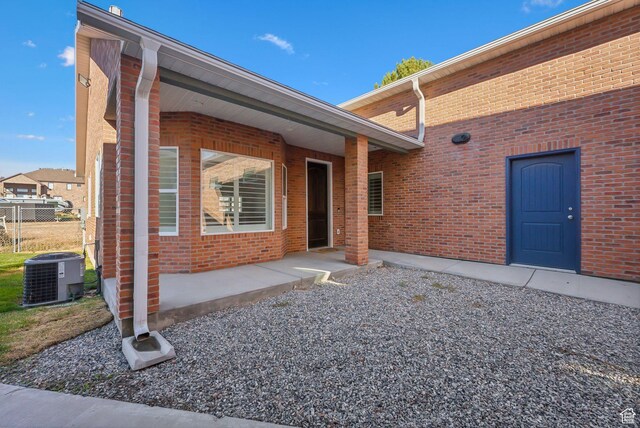 967 W Yamada Ct S, Syracuse, UT 84075 - doorway to property featuring brick siding