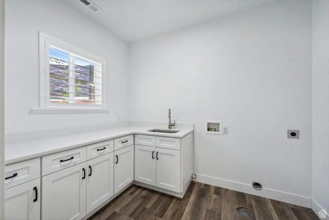 967 W Yamada Ct S, Syracuse, UT 84075 - laundry room with hookup for an electric dryer, hookup for a washing machine, cabinet space, and dark wood-style flooring