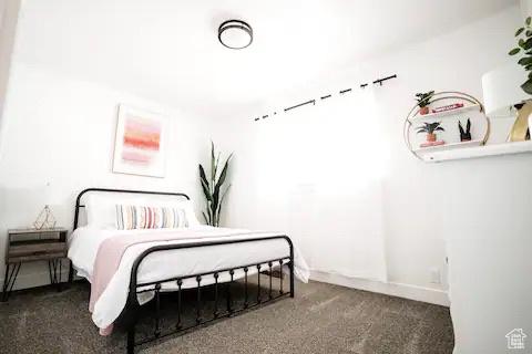 1065 E 22nd St, Ogden, UT 84401 - bedroom with carpet floors and baseboards