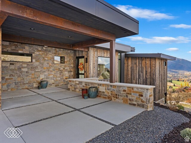 5731 E Porcupine Ridge Dr N, Eden, UT 84310 - view of patio / terrace featuring a mountain view