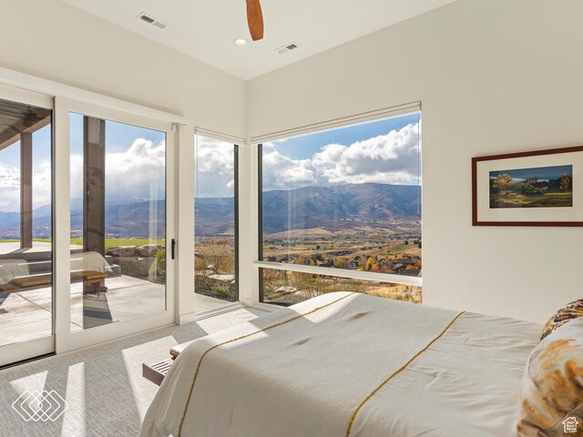 5731 E Porcupine Ridge Dr N, Eden, UT 84310 - carpeted bedroom with access to outside, a mountain view, ceiling fan, and recessed lighting