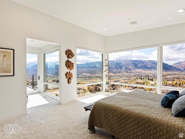 5731 E Porcupine Ridge Dr N, Eden, UT 84310 - bedroom with a mountain view, carpet flooring, and access to exterior