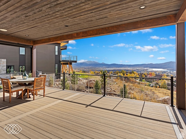 wooden terrace featuring a mountain view
