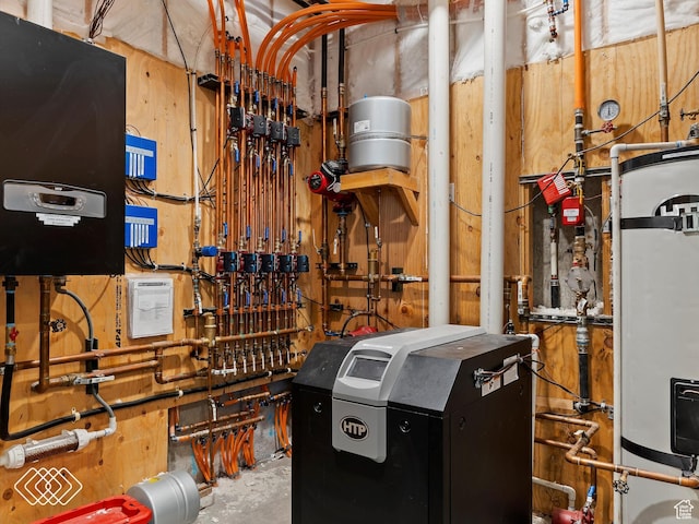 5731 E Porcupine Ridge Dr N, Eden, UT 84310 - utility room featuring water heater and a heating unit
