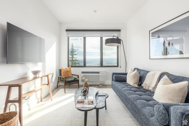 2303 Deer Hollow Rd Unit 1236, Park City, UT 84060 - living room with a wall unit AC and hardwood / wood-style flooring