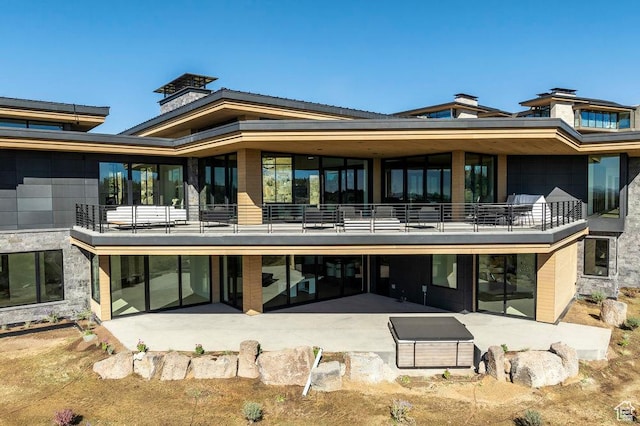 3821 Pinnacle Sky Loop, Park City, UT 84098 - rear view of property featuring a balcony and a patio