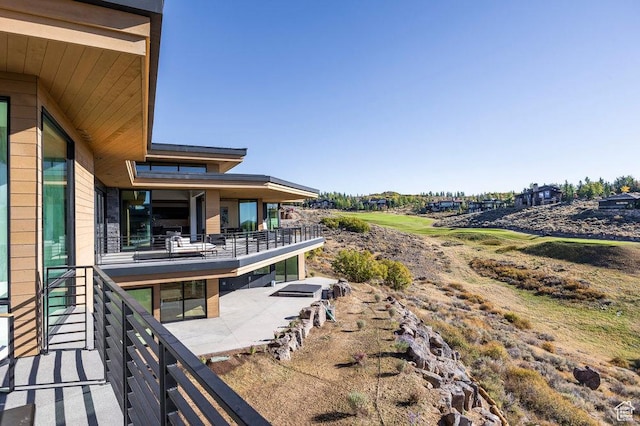 3821 Pinnacle Sky Loop, Park City, UT 84098 - view of yard featuring a patio area and a balcony