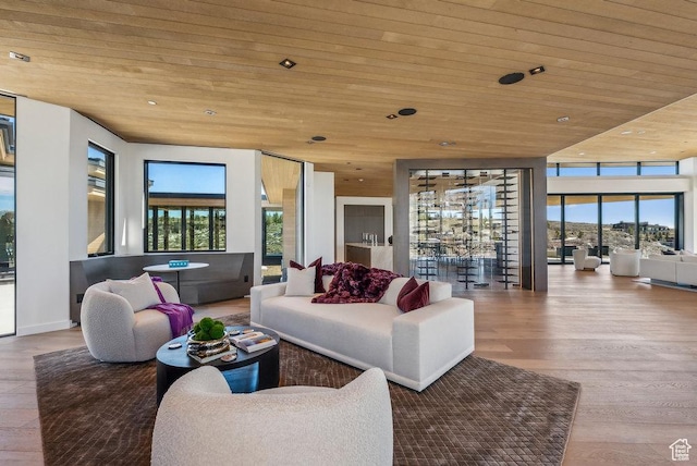 3821 Pinnacle Sky Loop, Park City, UT 84098 - living area with wooden ceiling, plenty of natural light, wood finished floors, and recessed lighting