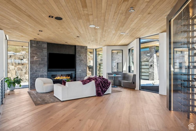 3821 Pinnacle Sky Loop, Park City, UT 84098 - living room featuring wood ceiling, wood finished floors, a fireplace, recessed lighting, and floor to ceiling windows