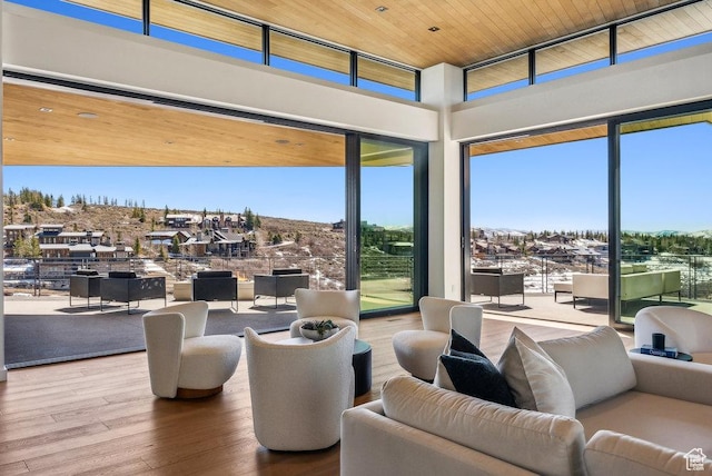 3821 Pinnacle Sky Loop, Park City, UT 84098 - living room featuring a high ceiling, wood finished floors, and wood ceiling