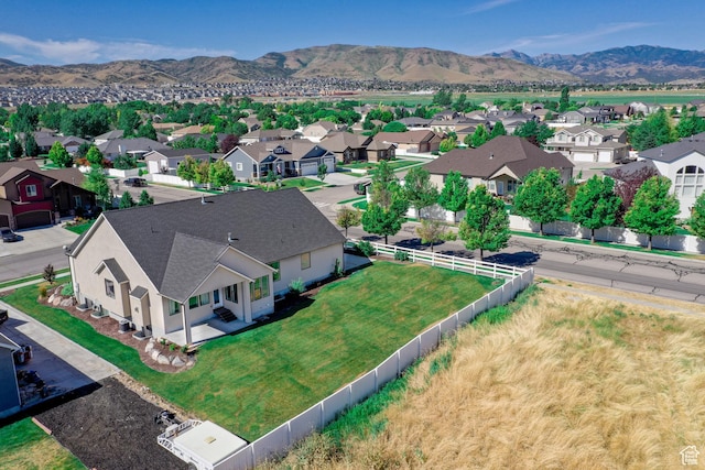 12751 S Harvest Ln W Unit 6, Riverton, UT 84096 - drone / aerial view featuring a mountain view and a residential view