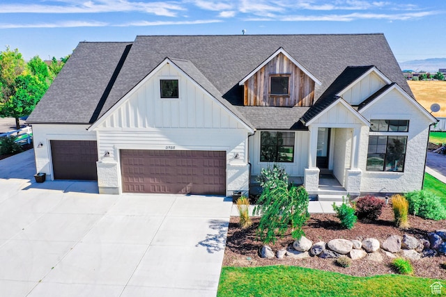 12751 S Harvest Ln W Unit 6, Riverton, UT 84096 - modern farmhouse style home with driveway, an attached garage, board and batten siding, and roof with shingles